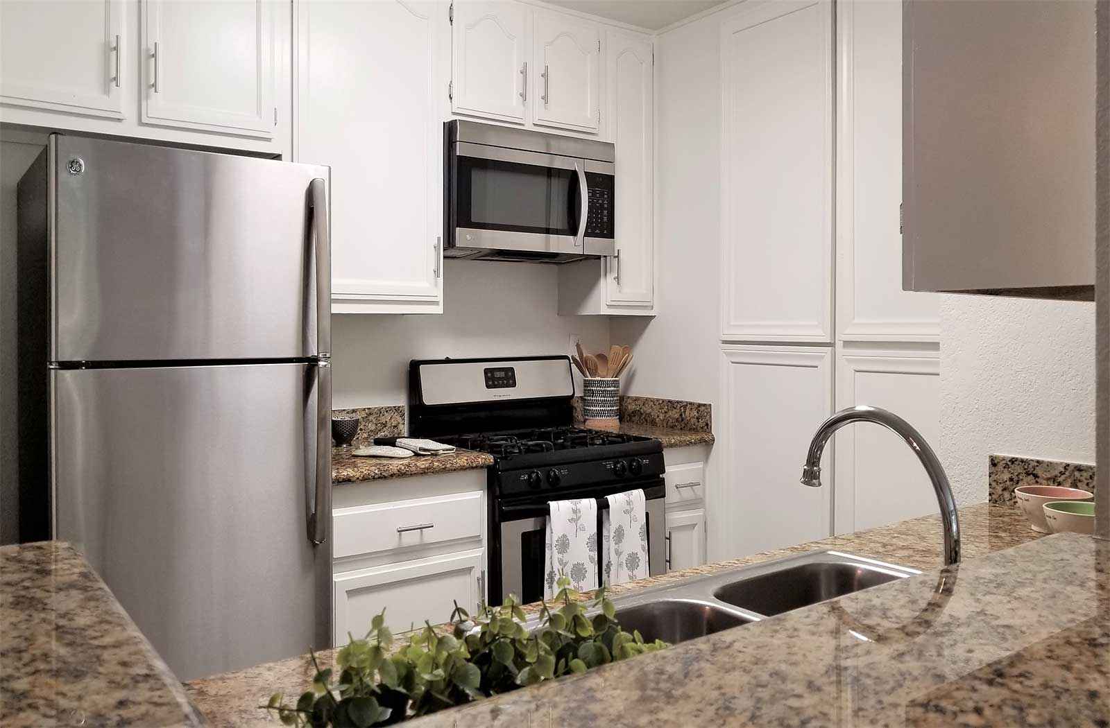 renovated kitchen with stainless steel appliances