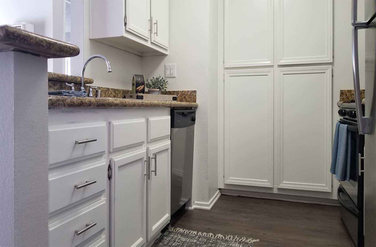 modern kitchen layout with built in dishwasher