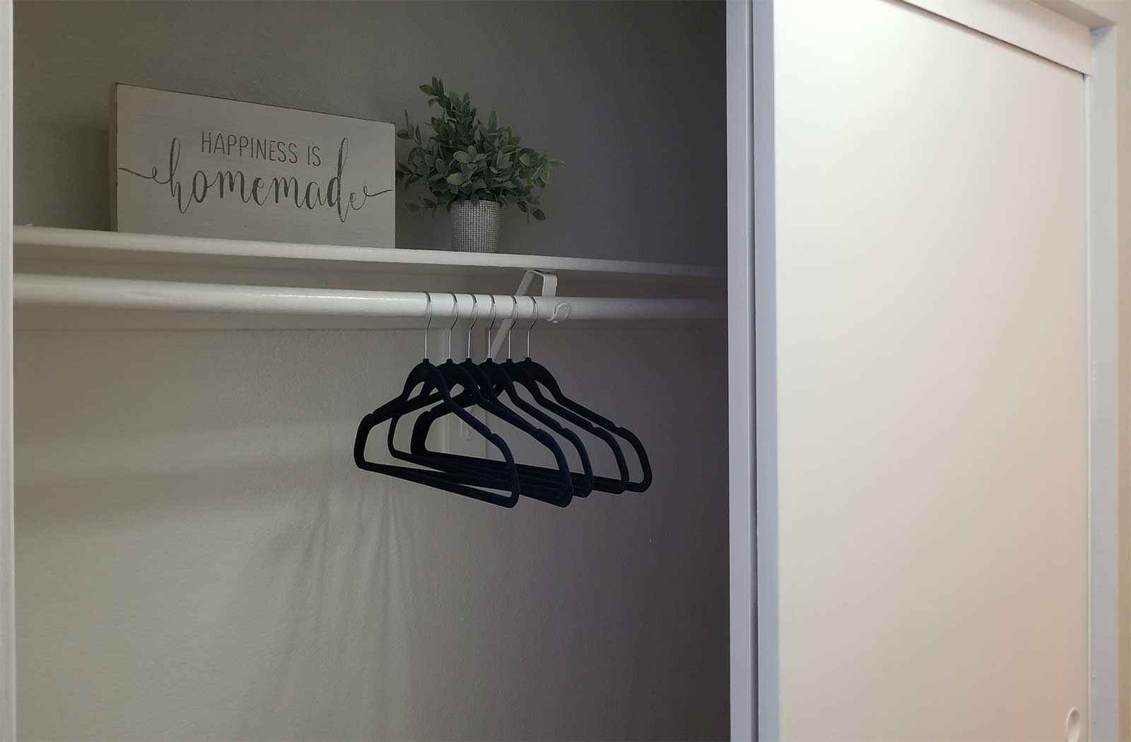 bedroom closet with built in shelving